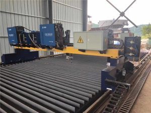 Double découpeuse de plasma de commande numérique par ordinateur de portique d'entraînement pour couper la chaîne de production de poutre en double T en acier solide